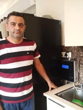 Chanson Quality Water Purifier ensuring a man's daily clean water intake